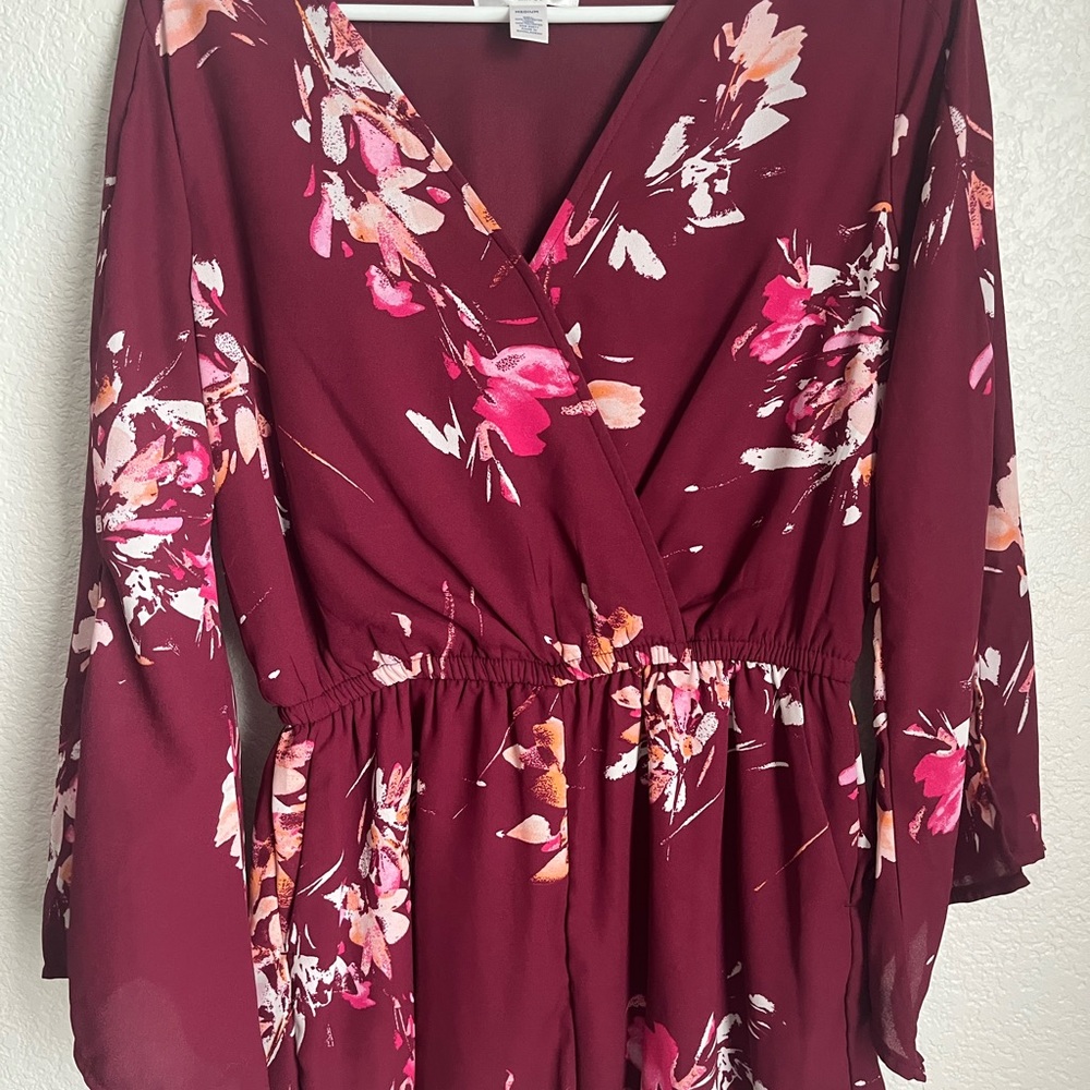 Pink floral romper with long sleeves
